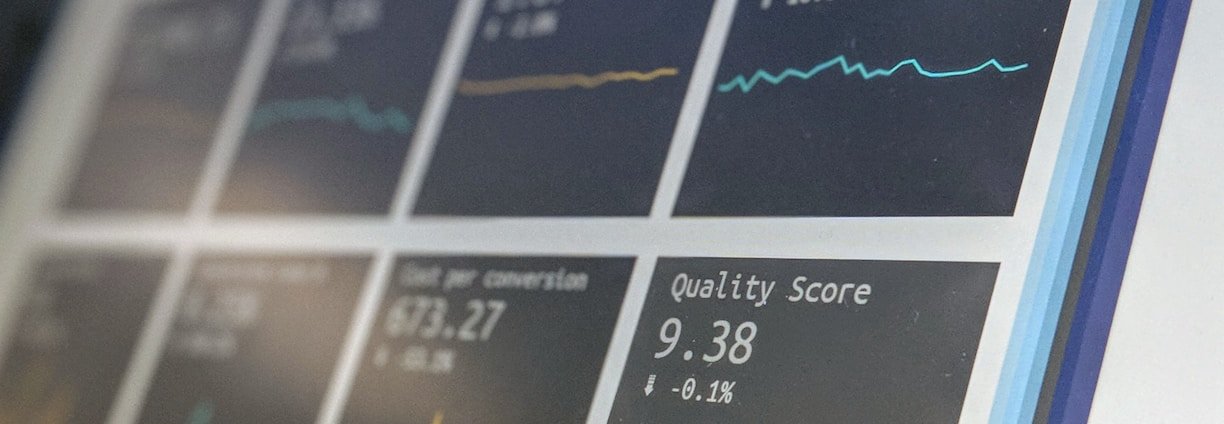 A team monitoring performance data on a screen